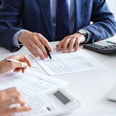 Financial planner looking over documents