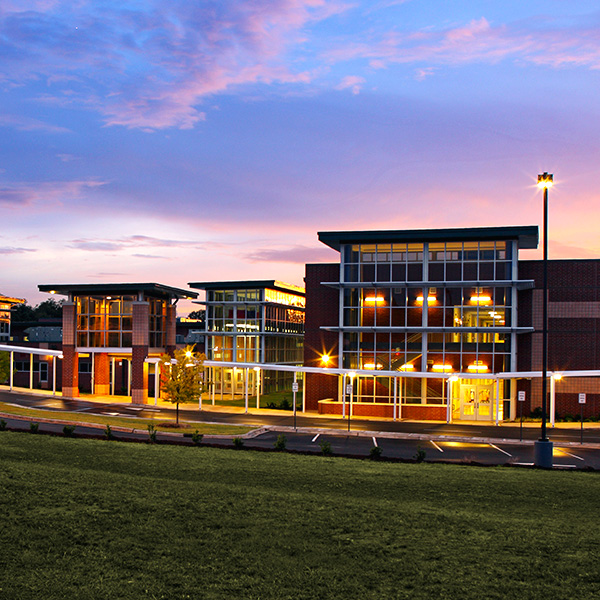 Exterior of high school at dusk