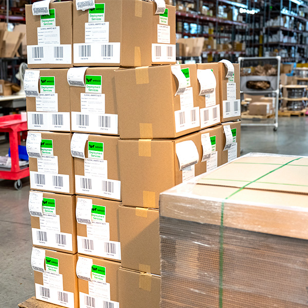 Kitting MOD boxes on palette in Wesco warehouse