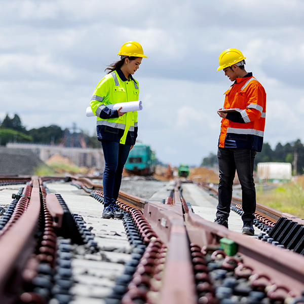 Engineers inspecting railroad tracks