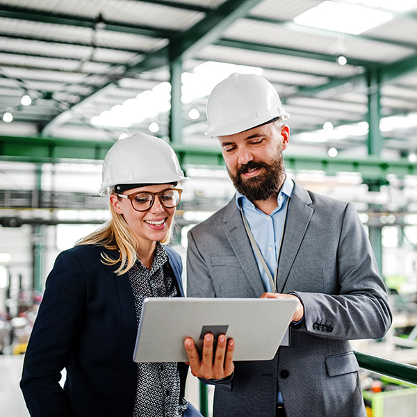 Engineer monitoring automation factory.