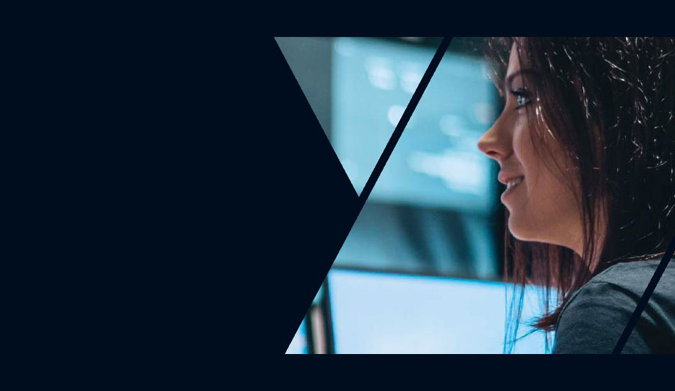 Woman smiling profile TV Screens in the background